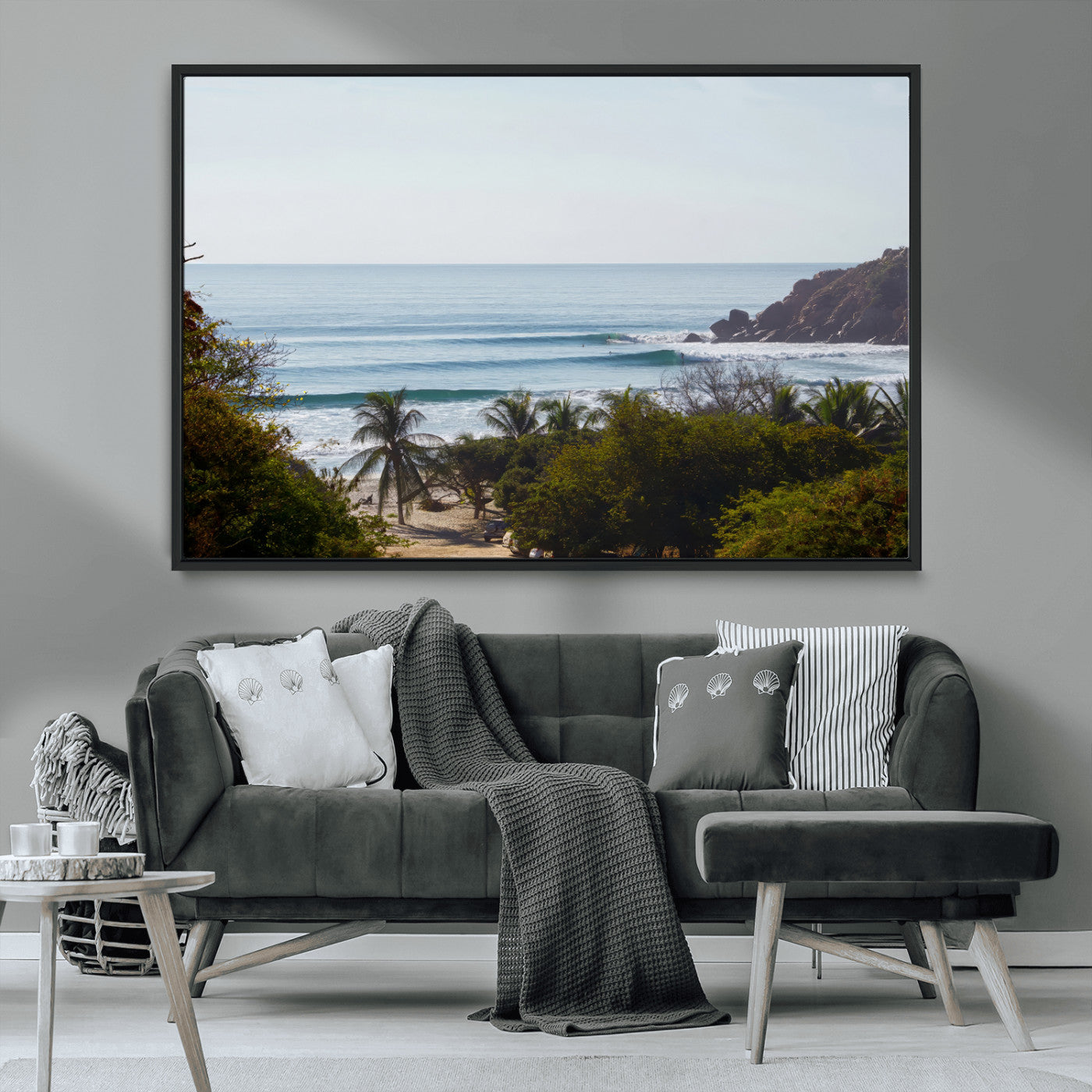 View of calm ocean waves with palm trees and a tropical coastline, ideal for coastal boho or beach-themed wall decor.