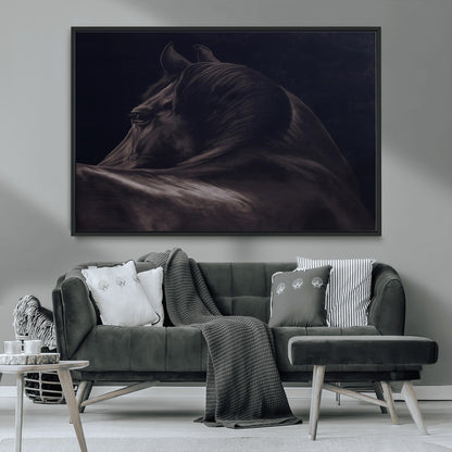 Close-up of a black horse with dramatic lighting on a dark background, perfect for rustic or masculine home decor.