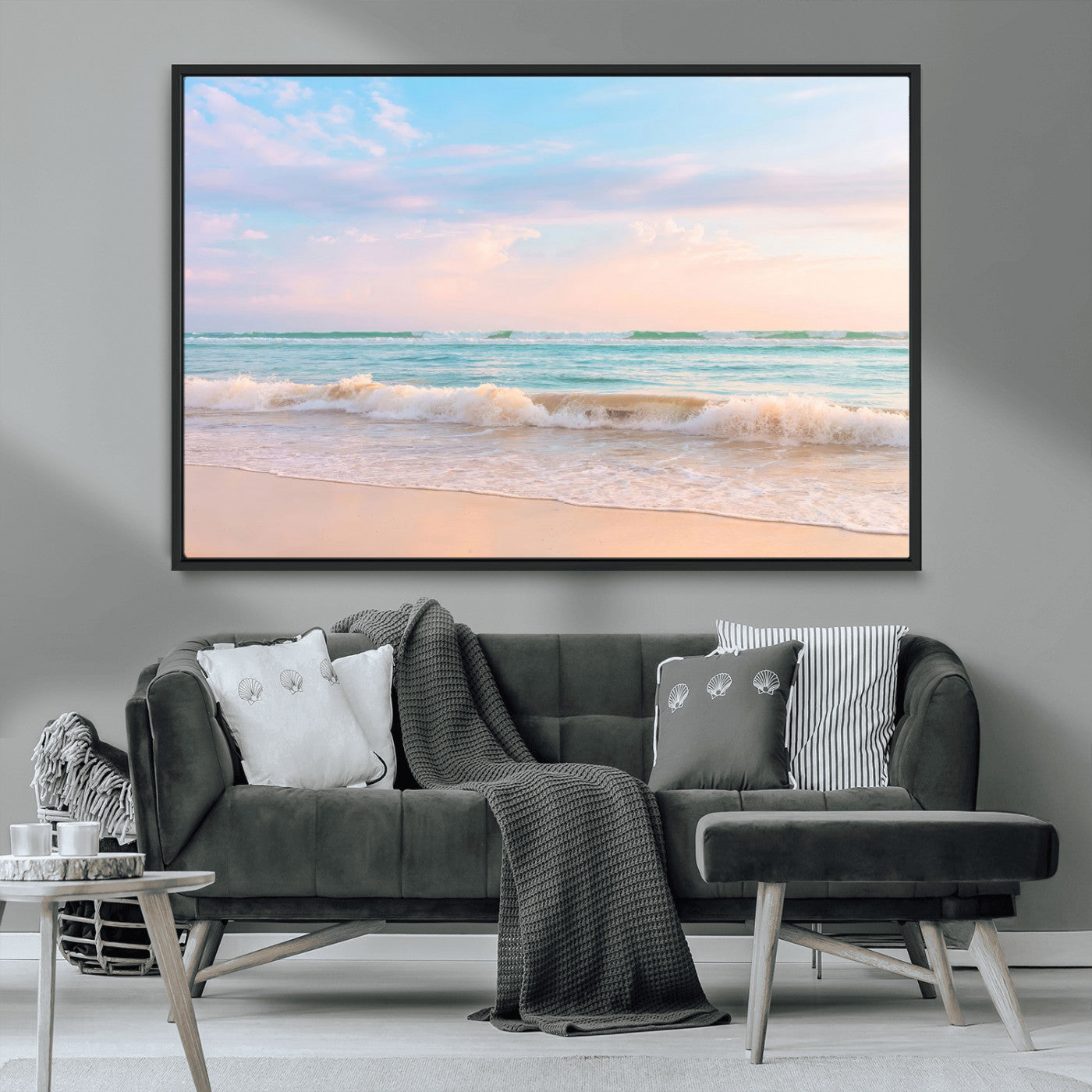 A peaceful beach scene with soft pastel skies, gentle waves washing up on the sandy shore, creating a calm and serene ocean view.