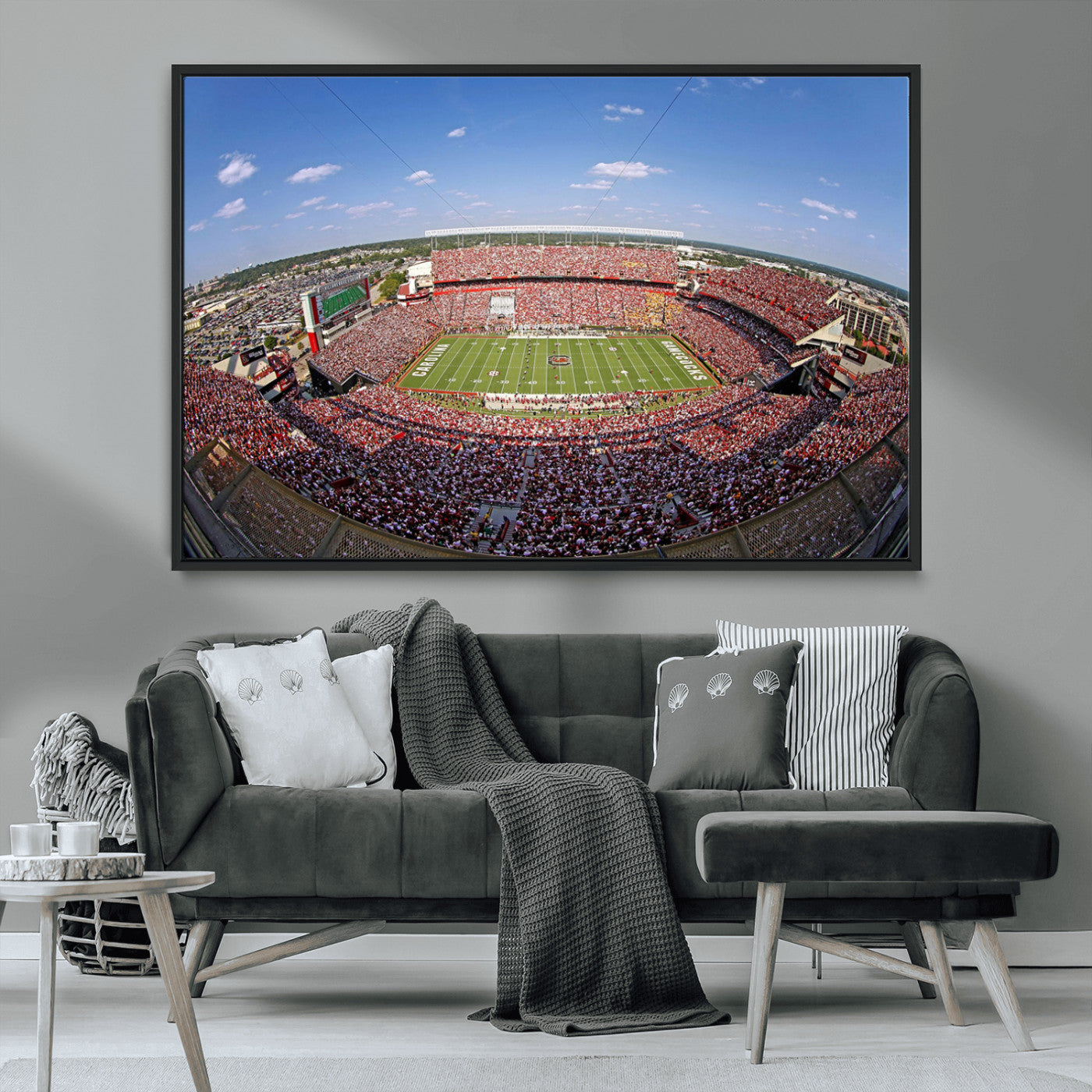 An William Brice-Stadium view of a full football stadium with cheering fans and clear blue skies, capturing the excitement and energy of the game.