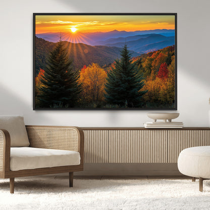 Vibrant sunset over autumn mountains with colorful trees and warm light, ideal for nature lovers or cabin-style wall decor.