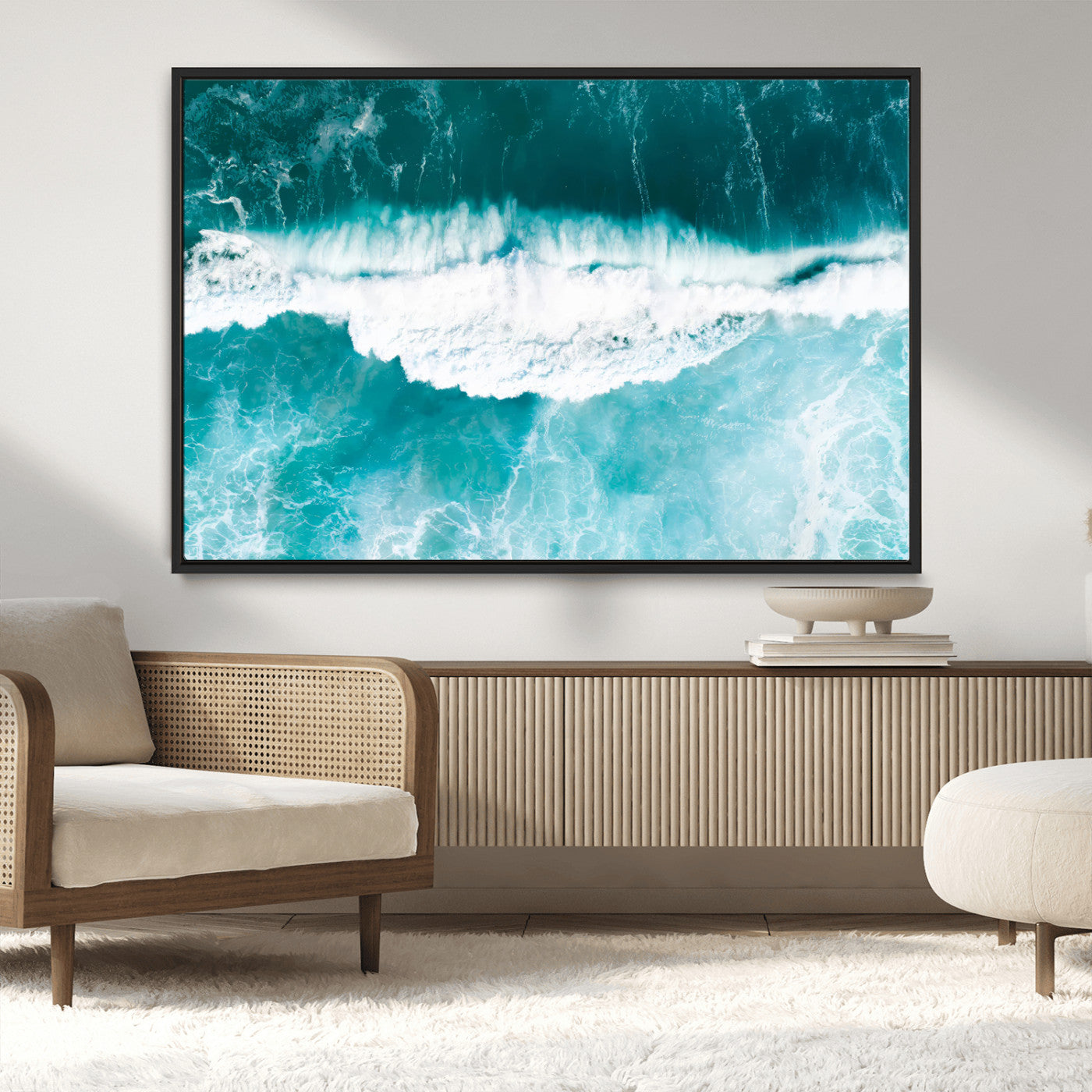Aerial view of turquoise ocean waves crashing with white foam, perfect for tropical coastal or modern beach-style home decor.