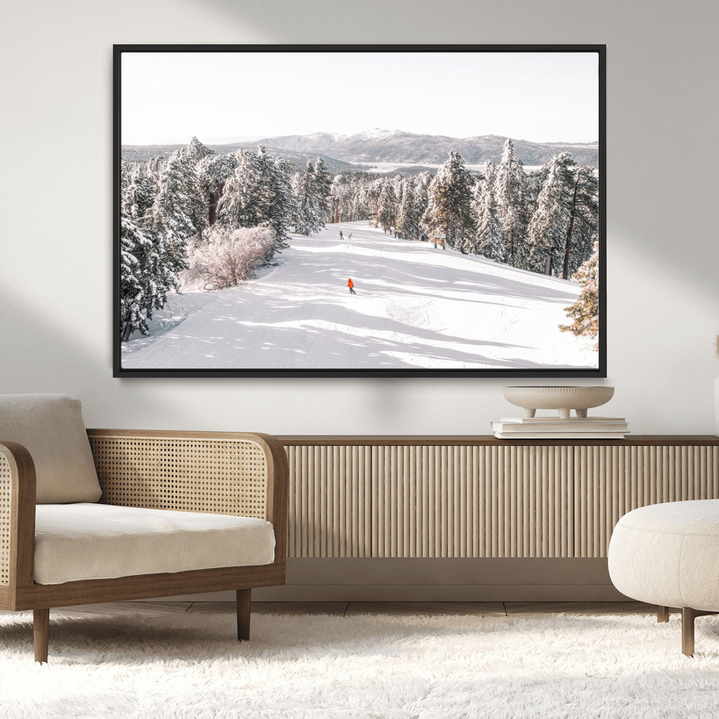 Bright ski trail lined with snow-covered pines and a skier in orange, perfect for alpine adventure or winter sports-inspired decor.