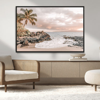 A peaceful beach scene with a palm tree and rocks, soft waves washing onto the shore under a soft pastel sky at sunset.