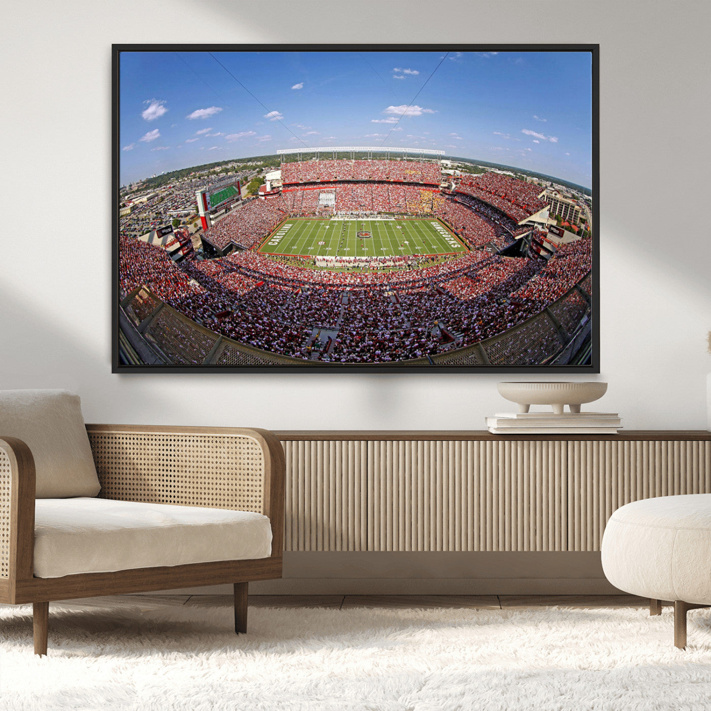 An William Brice-Stadium view of a full football stadium with cheering fans and clear blue skies, capturing the excitement and energy of the game.