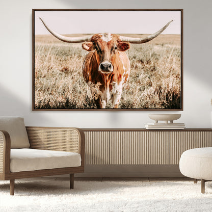 Framed longhorn cow canvas wall art with rustic prairie background, western animal print perfect for farmhouse or ranch style decor