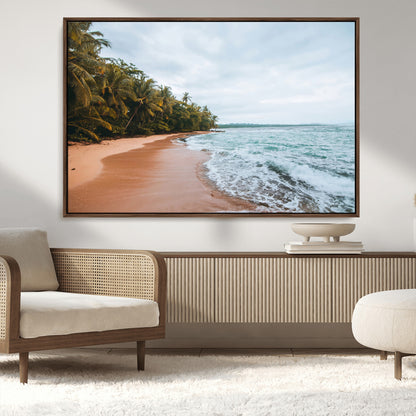 Framed canvas of a tropical beach with palm trees and soft waves, ideal for coastal escape or serene nature-inspired home decor.