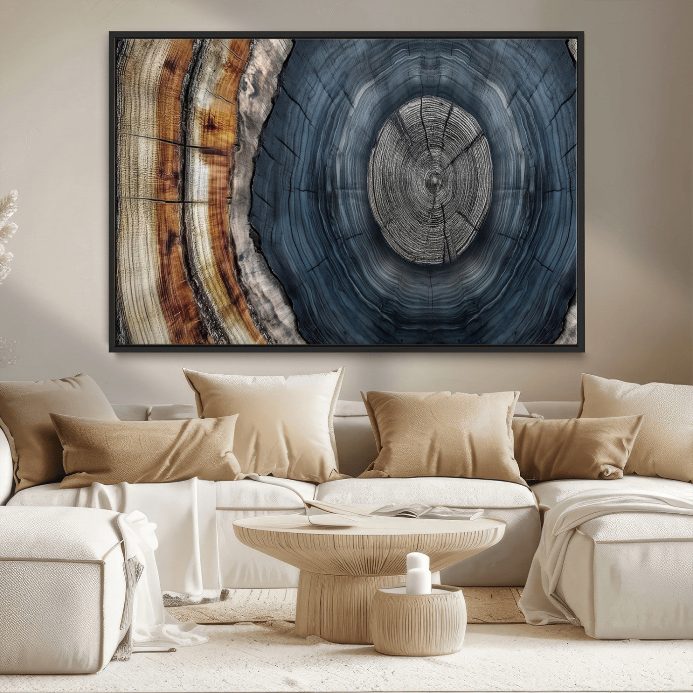 A stunning close-up of a tree trunk showing the intricate, circular growth rings, showcasing the natural textures and rich contrasts in deep blues, browns, and silvers.