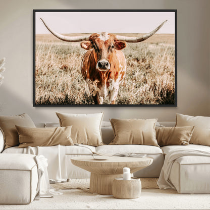 Framed longhorn cow canvas wall art with rustic prairie background, western animal print perfect for farmhouse or ranch style decor