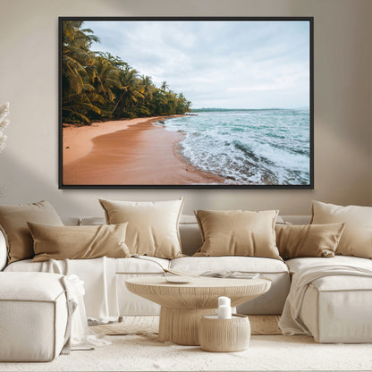 Framed canvas of a tropical beach with palm trees and soft waves, ideal for coastal escape or serene nature-inspired home decor.