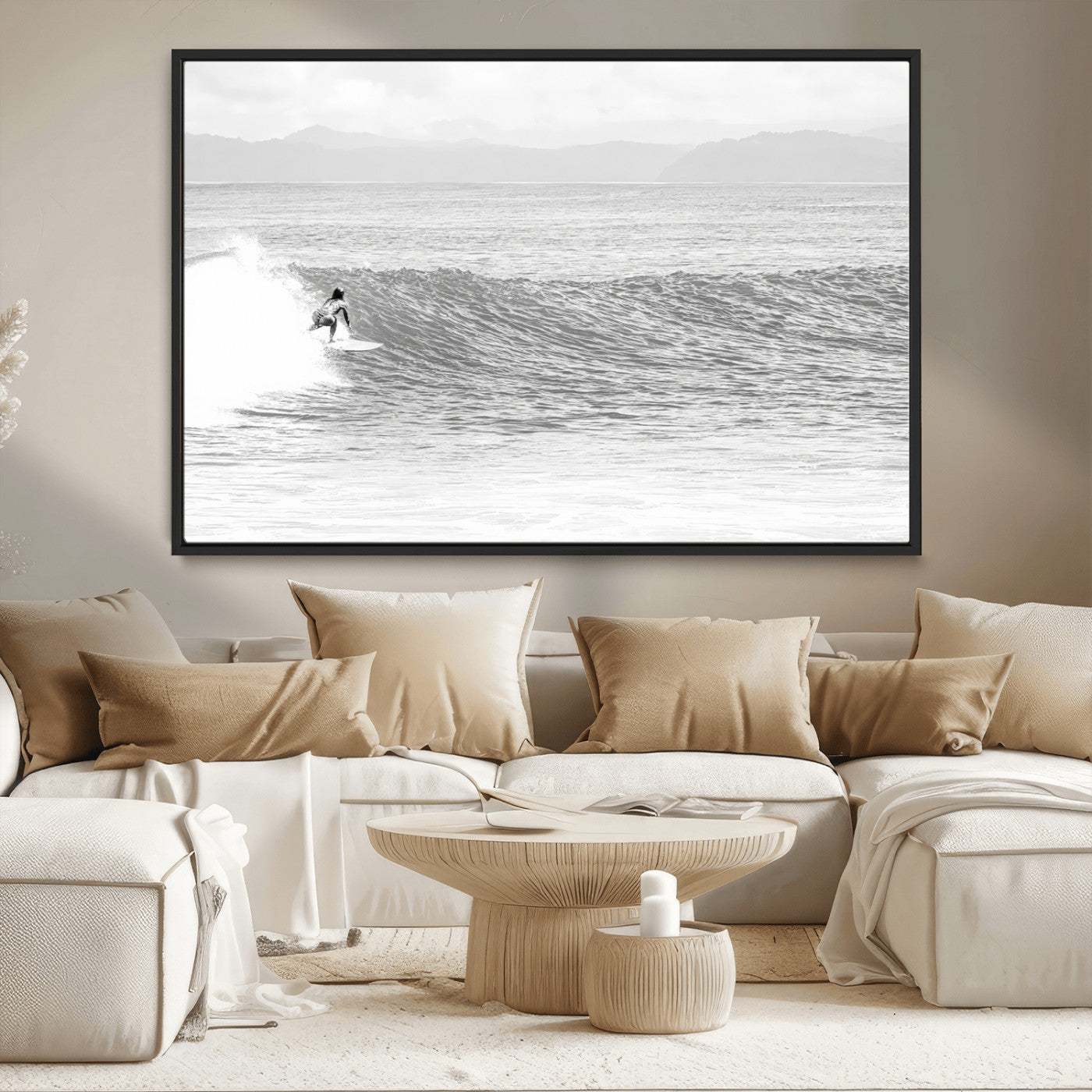 Monochrome photo of a surfer riding a wave with distant mountains, ideal for coastal motion or black and white surf-themed wall decor.