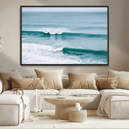 Powerful ocean waves rolling towards the shore, their turquoise hues blending with white sea foam under an open horizon, capturing the essence of the ocean's movement.