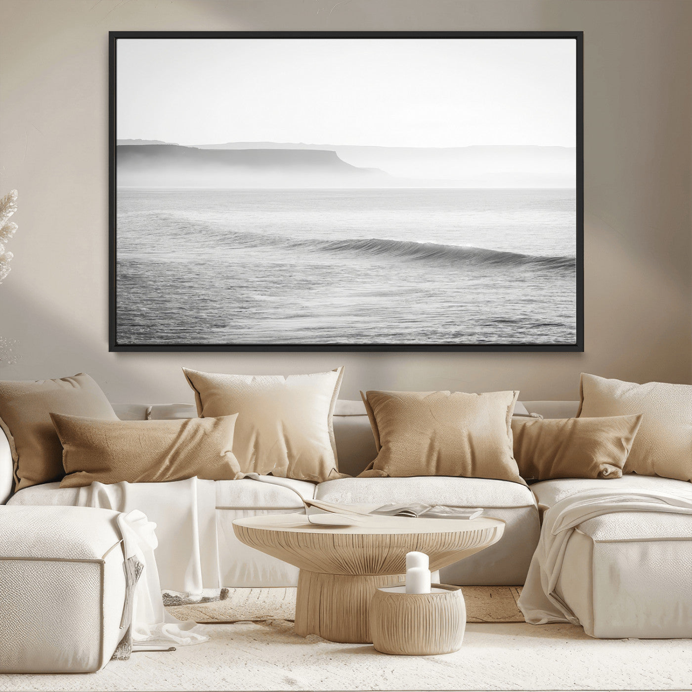 A black and white minimalist seascape featuring soft rolling waves and misty distant cliffs, creating a serene and timeless coastal atmosphere.