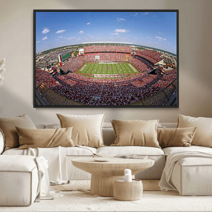 An William Brice-Stadium view of a full football stadium with cheering fans and clear blue skies, capturing the excitement and energy of the game.