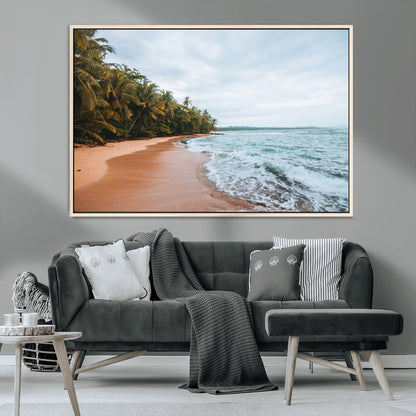 Framed canvas of a tropical beach with palm trees and soft waves, ideal for coastal escape or serene nature-inspired home decor.