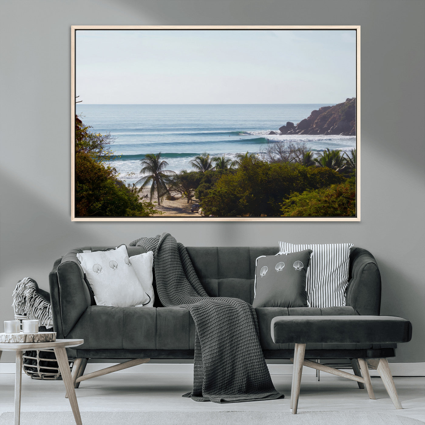 View of calm ocean waves with palm trees and a tropical coastline, ideal for coastal boho or beach-themed wall decor.