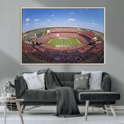 An William Brice-Stadium view of a full football stadium with cheering fans and clear blue skies, capturing the excitement and energy of the game.