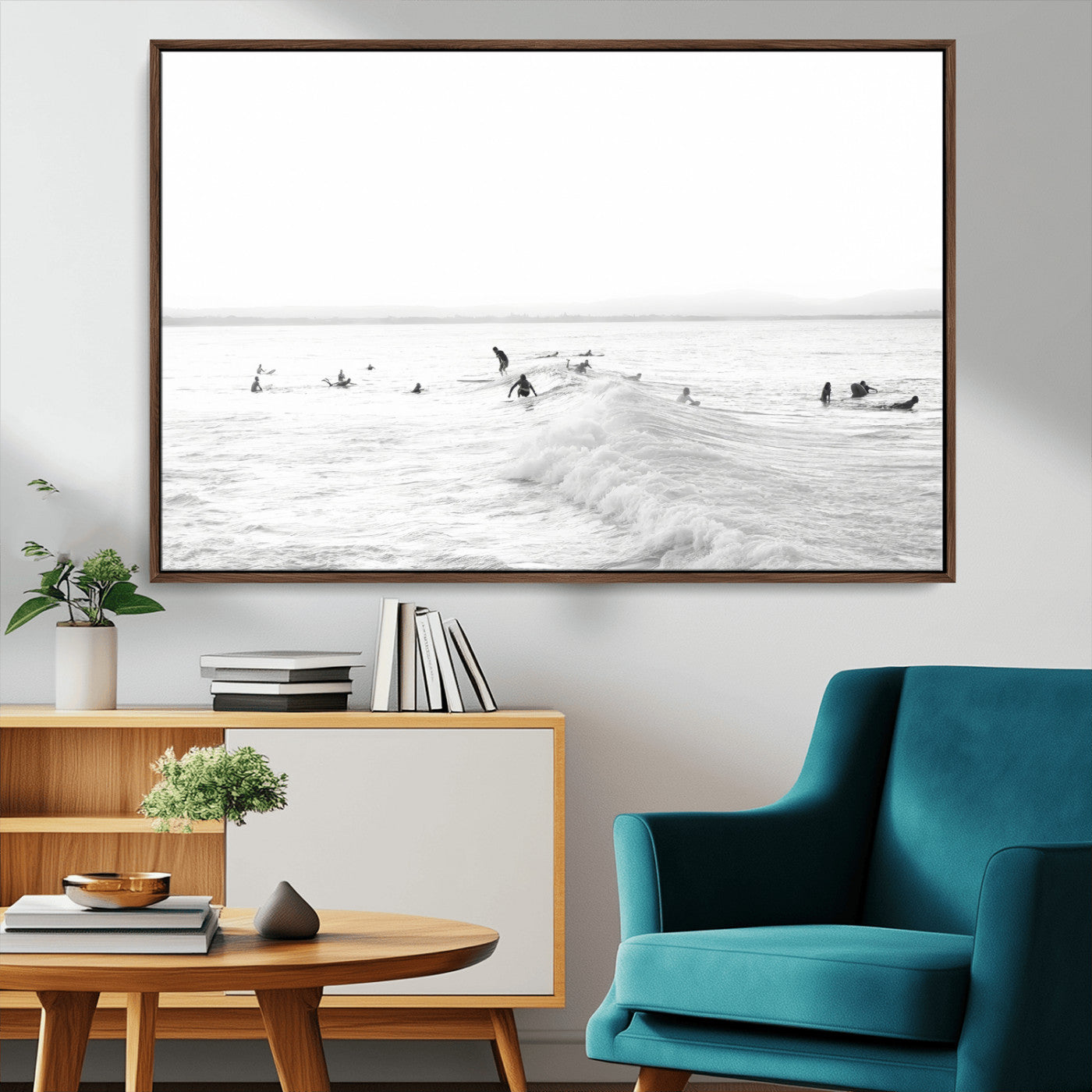 Monochrome photo of surfers riding and waiting on ocean waves, ideal for surf-themed or coastal energy wall decor.