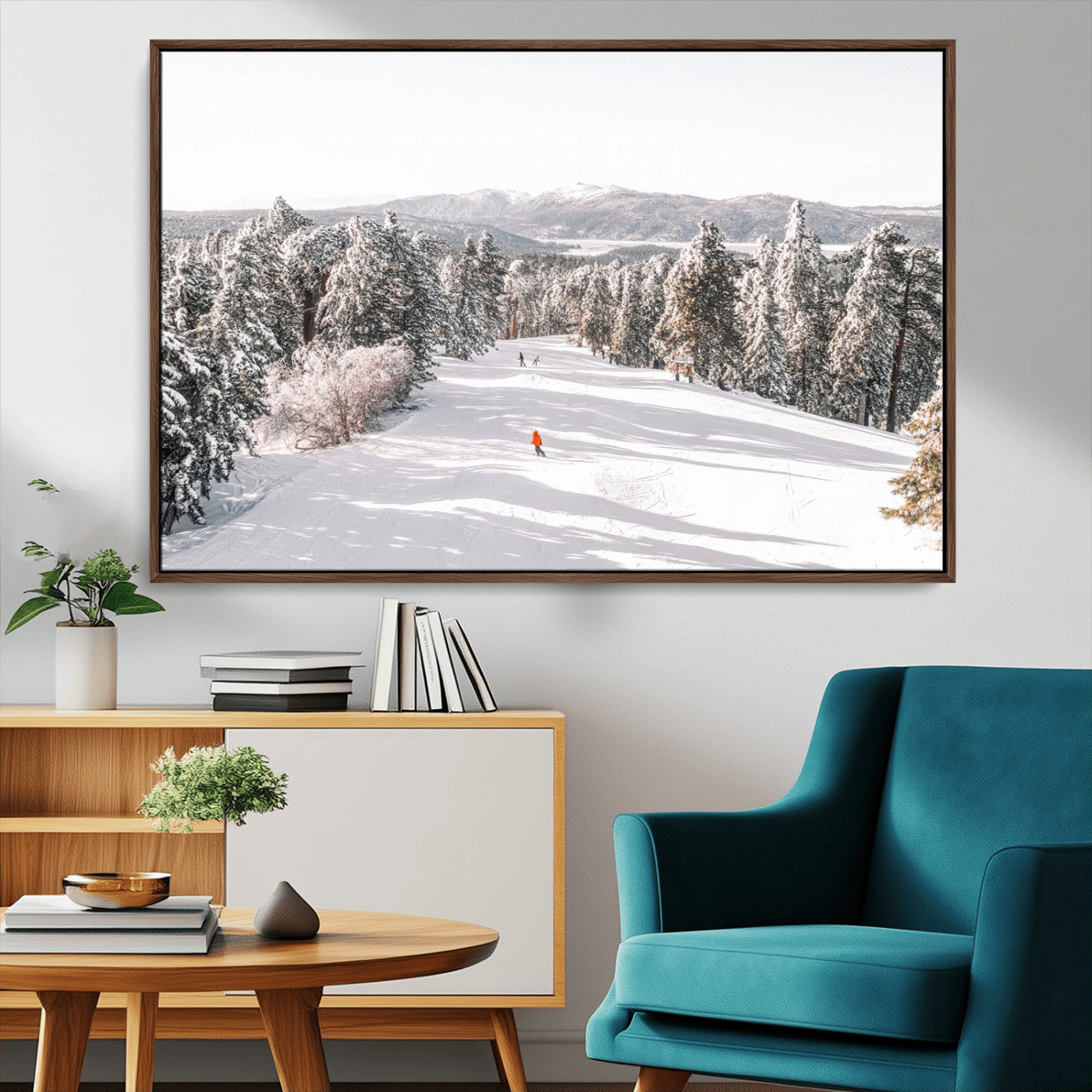 Bright ski trail lined with snow-covered pines and a skier in orange, perfect for alpine adventure or winter sports-inspired decor.