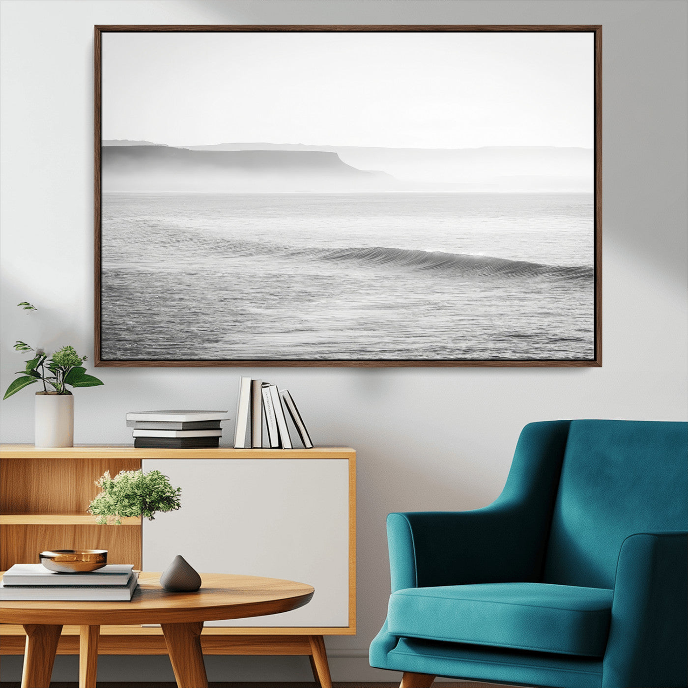 A black and white minimalist seascape featuring soft rolling waves and misty distant cliffs, creating a serene and timeless coastal atmosphere.