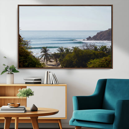 View of calm ocean waves with palm trees and a tropical coastline, ideal for coastal boho or beach-themed wall decor.