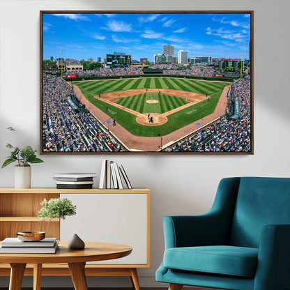 A wide-angle shot of a baseball field filled with spectators, with players on the field and the iconic Wrigley Field scoreboard in the background.