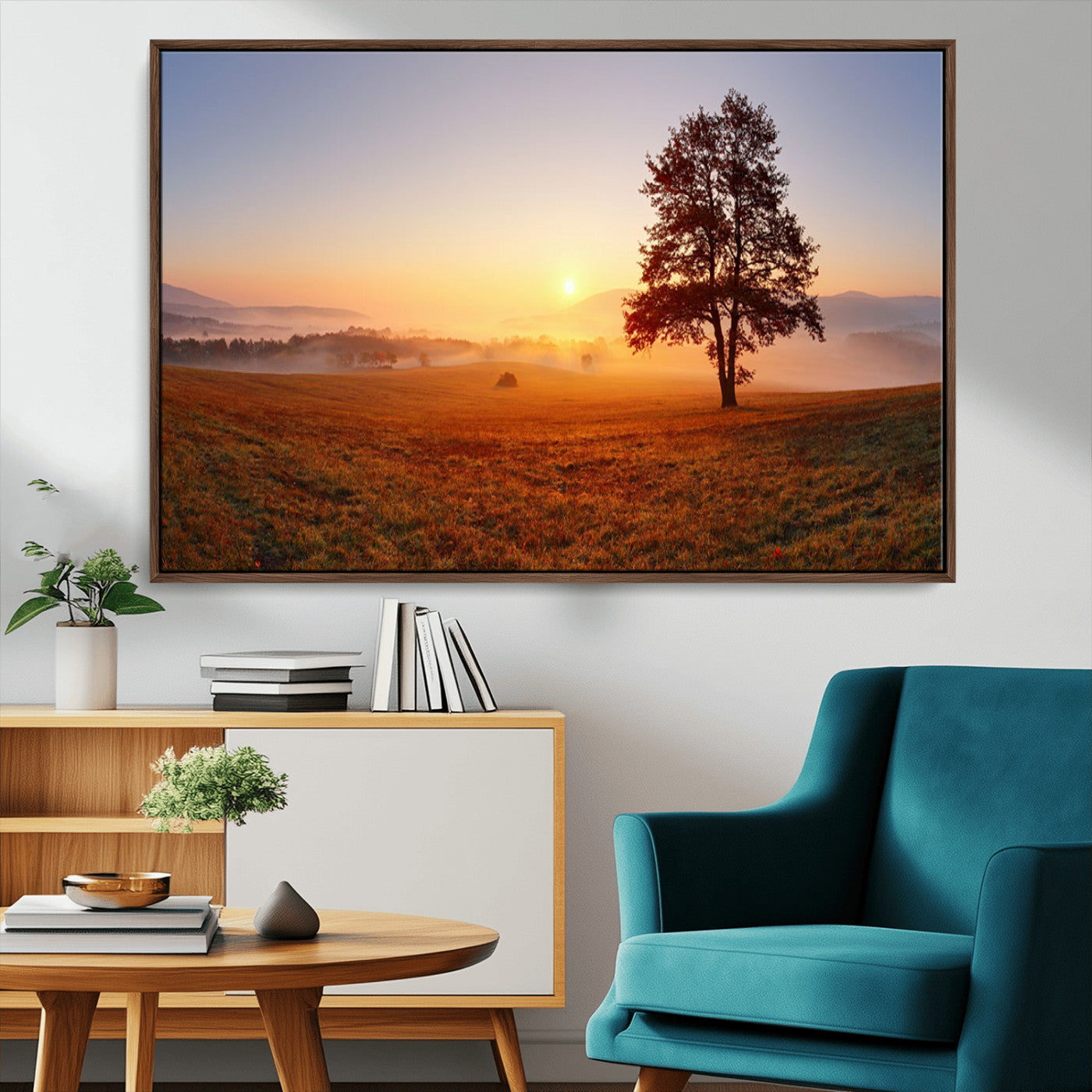 A tranquil landscape at sunrise with a mist-covered field and a lone tree, creating a peaceful and natural atmosphere.