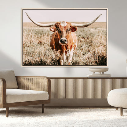 Framed longhorn cow canvas wall art with rustic prairie background, western animal print perfect for farmhouse or ranch style decor