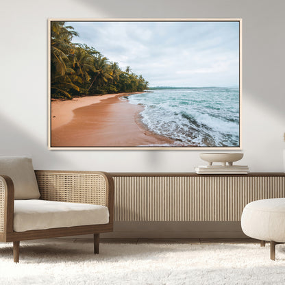 Framed canvas of a tropical beach with palm trees and soft waves, ideal for coastal escape or serene nature-inspired home decor.