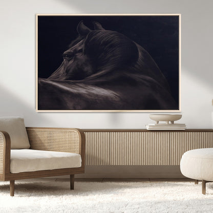 Close-up of a black horse with dramatic lighting on a dark background, perfect for rustic or masculine home decor.