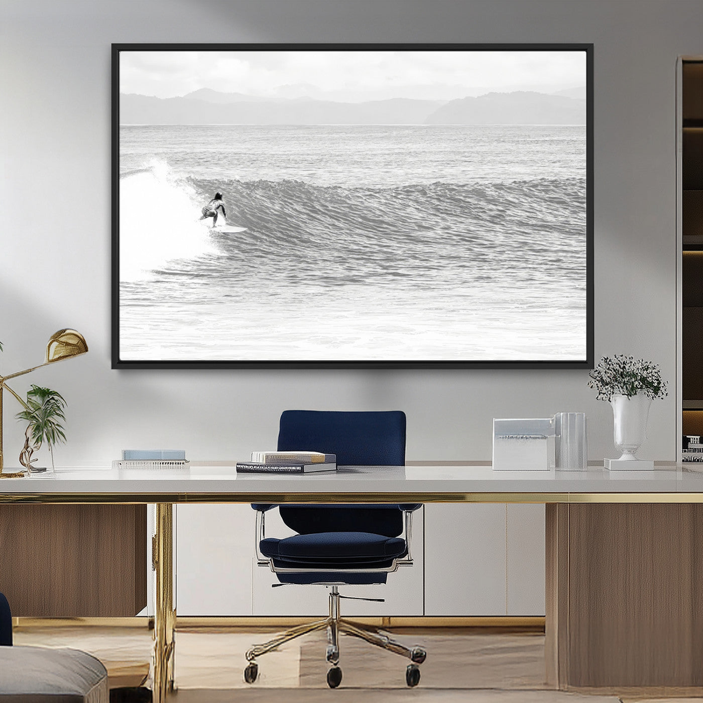 Monochrome photo of a surfer riding a wave with distant mountains, ideal for coastal motion or black and white surf-themed wall decor.