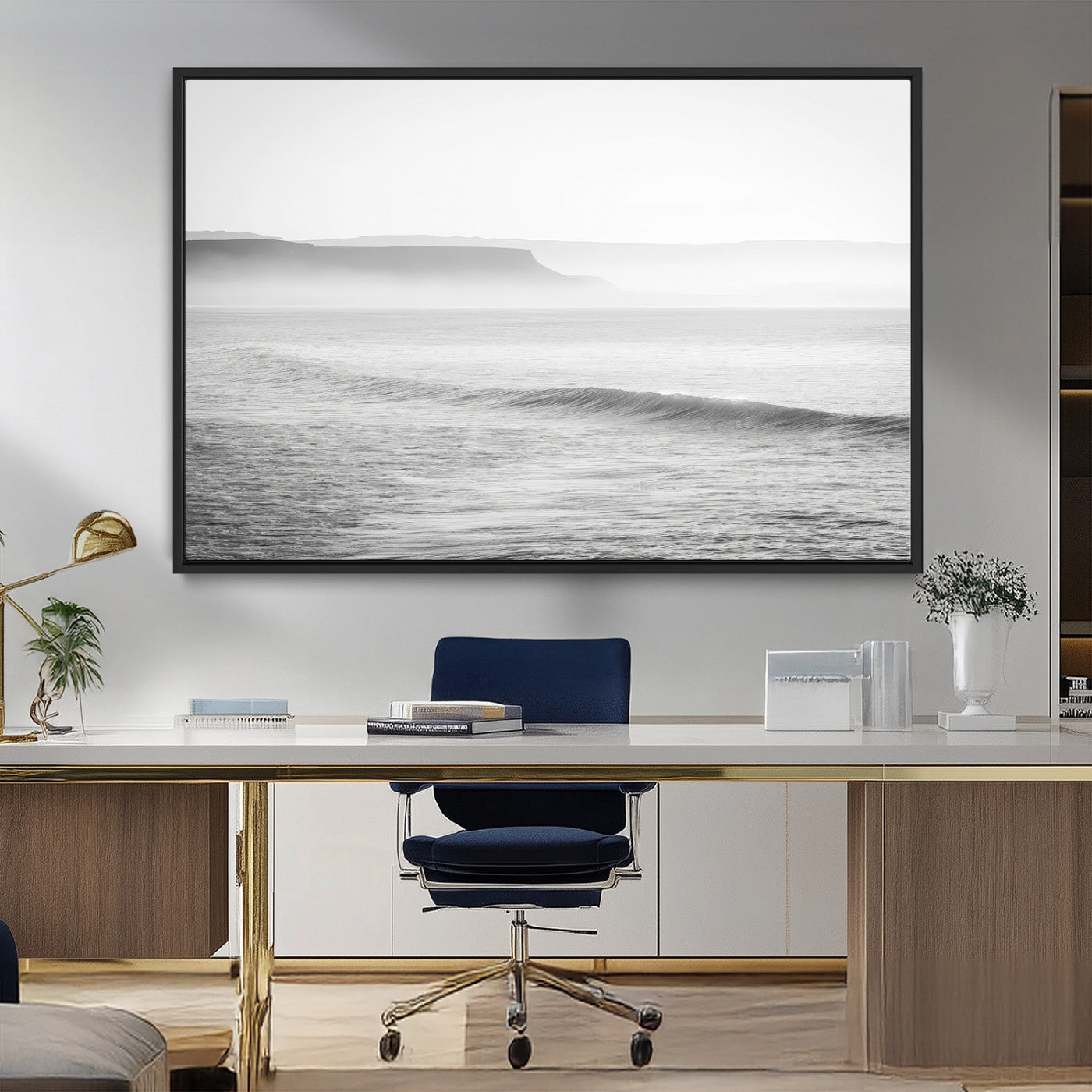A black and white minimalist seascape featuring soft rolling waves and misty distant cliffs, creating a serene and timeless coastal atmosphere.