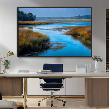 A peaceful marshland scene with calm blue water reflecting the surrounding grasses and trees, capturing the beauty of nature in a serene landscape.