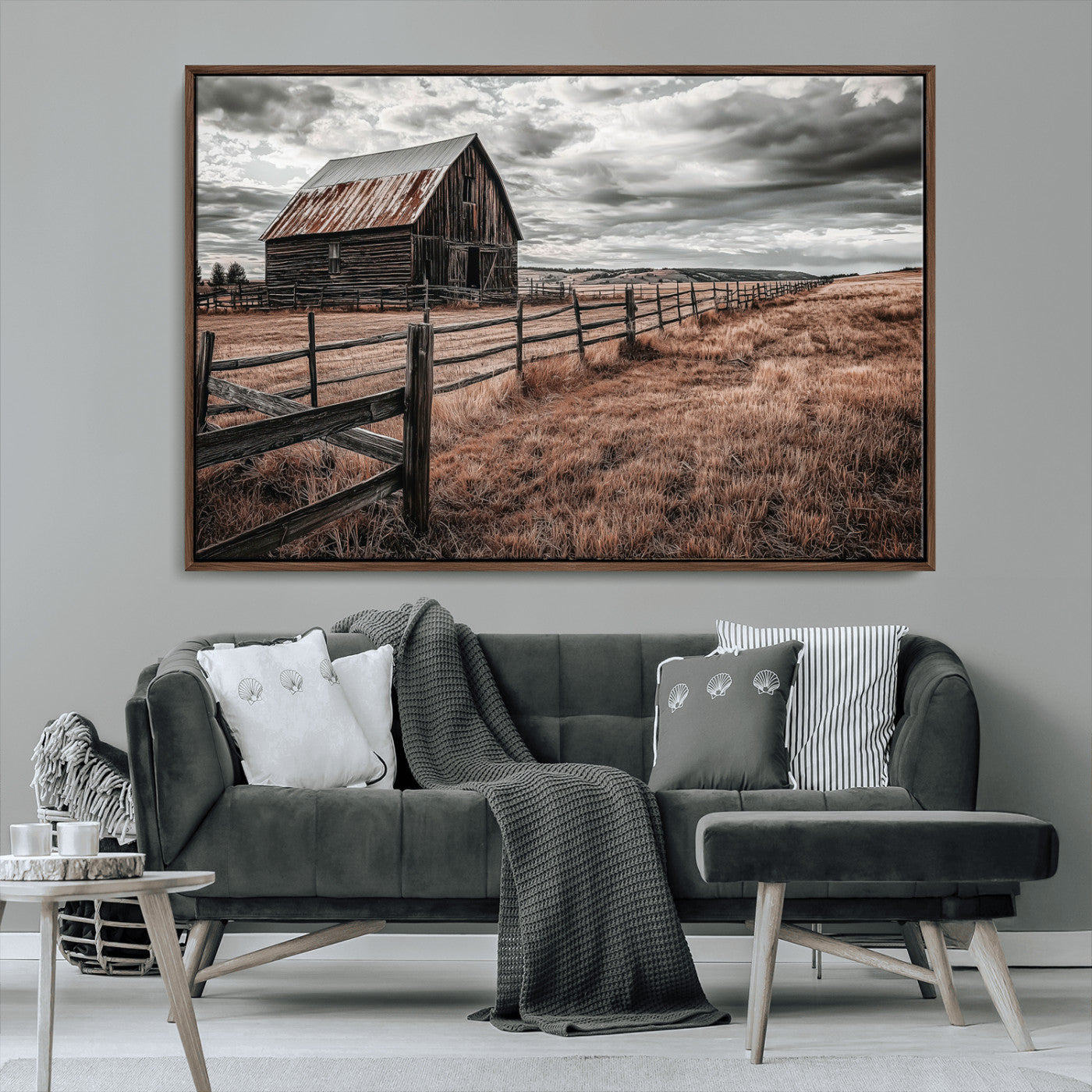 Framed canvas of a rustic barn under a moody sky with weathered fence and dark fields, ideal for farmhouse or rural-style wall decor.