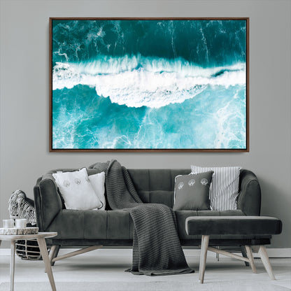 Aerial view of turquoise ocean waves crashing with white foam, perfect for tropical coastal or modern beach-style home decor.