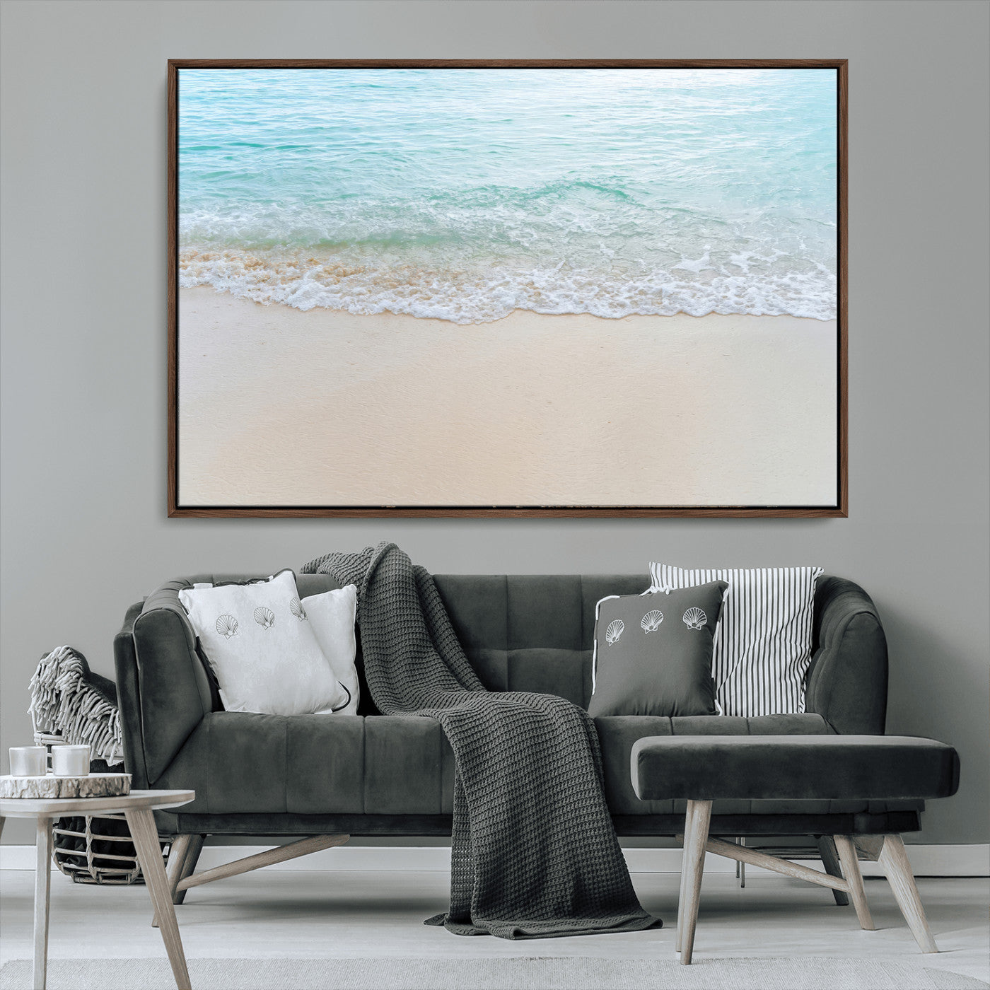 Soft shoreline with gentle aqua waves on smooth sand, ideal for minimalist coastal or pastel ocean-inspired home wall decor.
