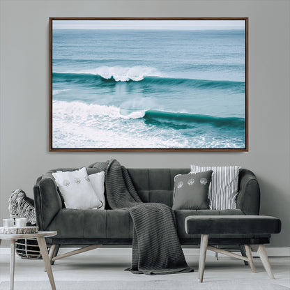 Powerful ocean waves rolling towards the shore, their turquoise hues blending with white sea foam under an open horizon, capturing the essence of the ocean's movement.
