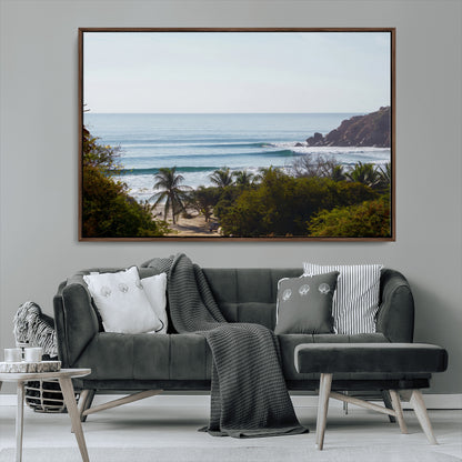View of calm ocean waves with palm trees and a tropical coastline, ideal for coastal boho or beach-themed wall decor.