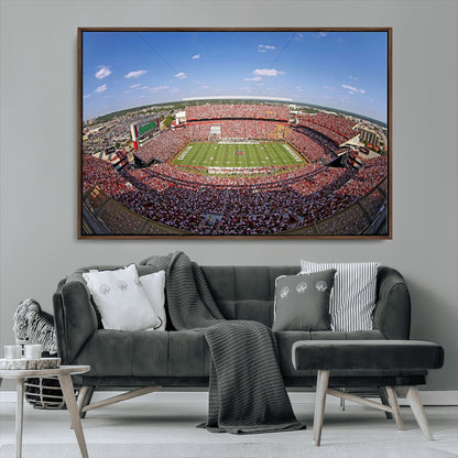 An William Brice-Stadium view of a full football stadium with cheering fans and clear blue skies, capturing the excitement and energy of the game.