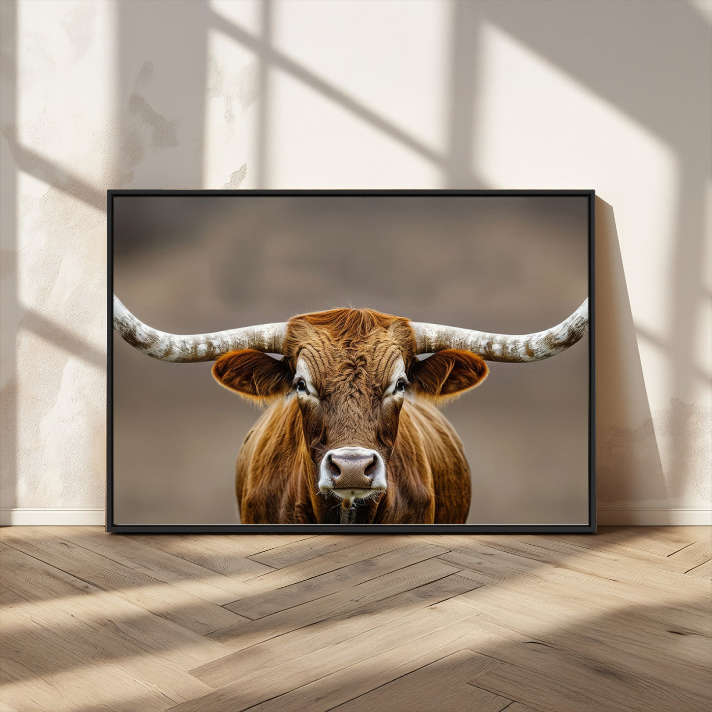 Close-up of a Texas Longhorn with strong curved horns and warm brown tones, perfect for rustic or western-style wall decor.