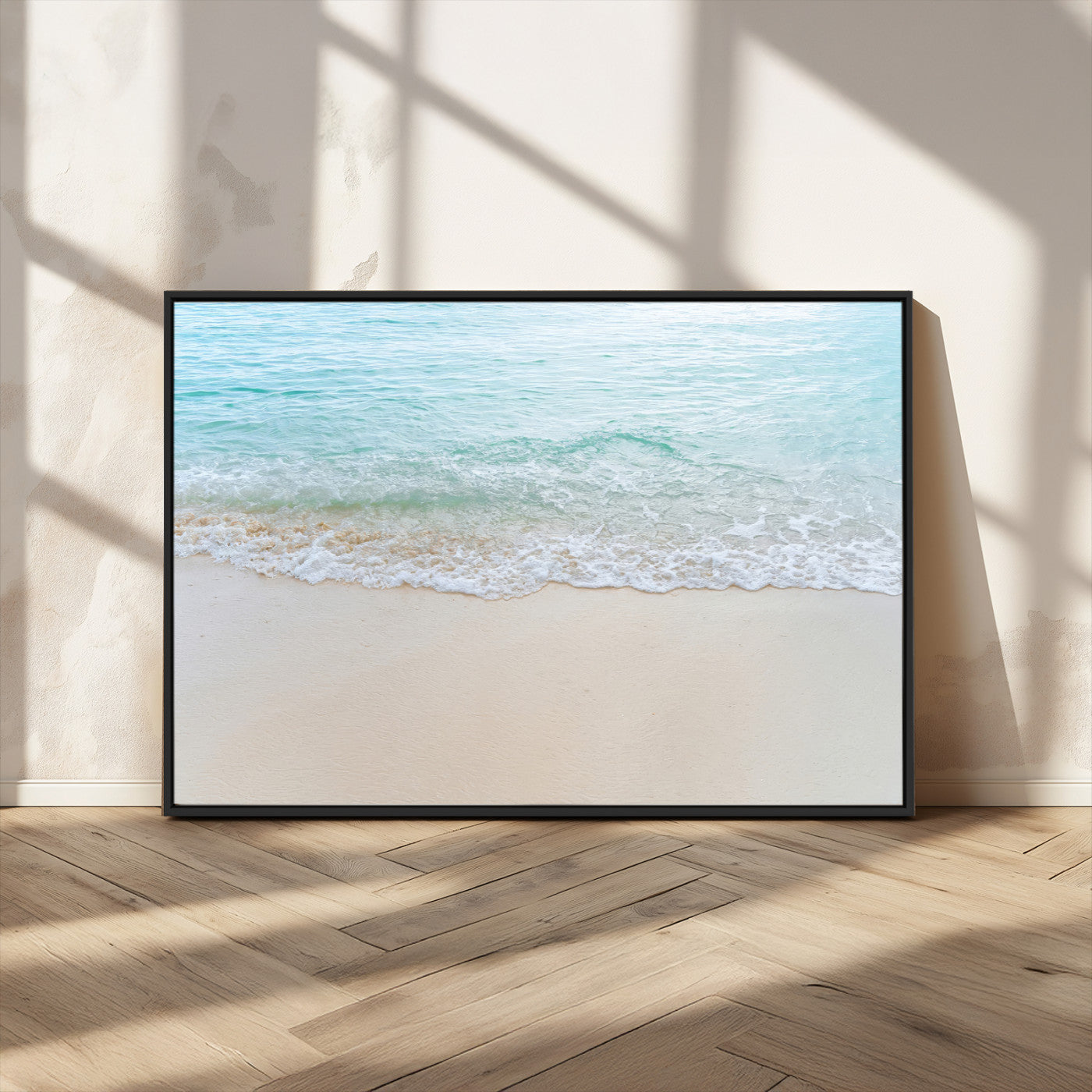 Soft shoreline with gentle aqua waves on smooth sand, ideal for minimalist coastal or pastel ocean-inspired home wall decor.