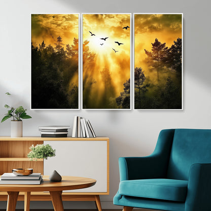 Canvas of a golden forest at sunset with birds flying through glowing sunbeams and silhouetted pine trees, ideal for warm-toned rustic decor.