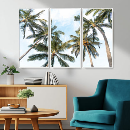 Framed canvas of tall palm trees reaching into a tropical sky, ideal for beach home or relaxed island-inspired wall decor.