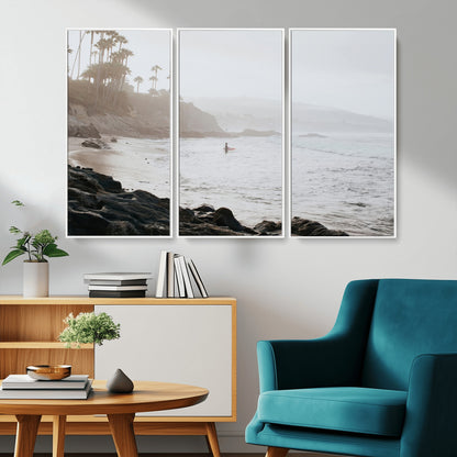 Framed canvas of a surfer in misty coastal tones at a foggy California beach, ideal for minimalist coastal beach or serene ocean-themed decor.