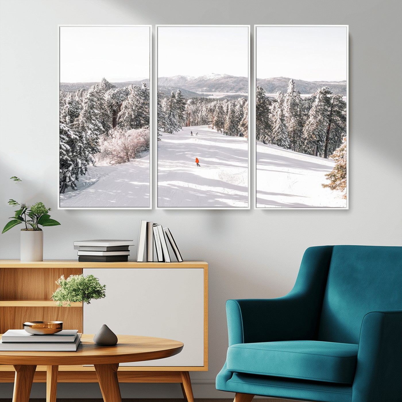 Bright ski trail lined with snow-covered pines and a skier in orange, perfect for alpine adventure or winter sports-inspired decor.