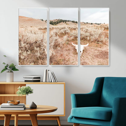 Rustic bull skull on dry sagebrush field under soft light, ideal for western minimal or desert prairie-style wall decoration.