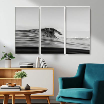 Striking black and white photo of a curling wave, ideal for modern coastal or minimalist wall decor settings.