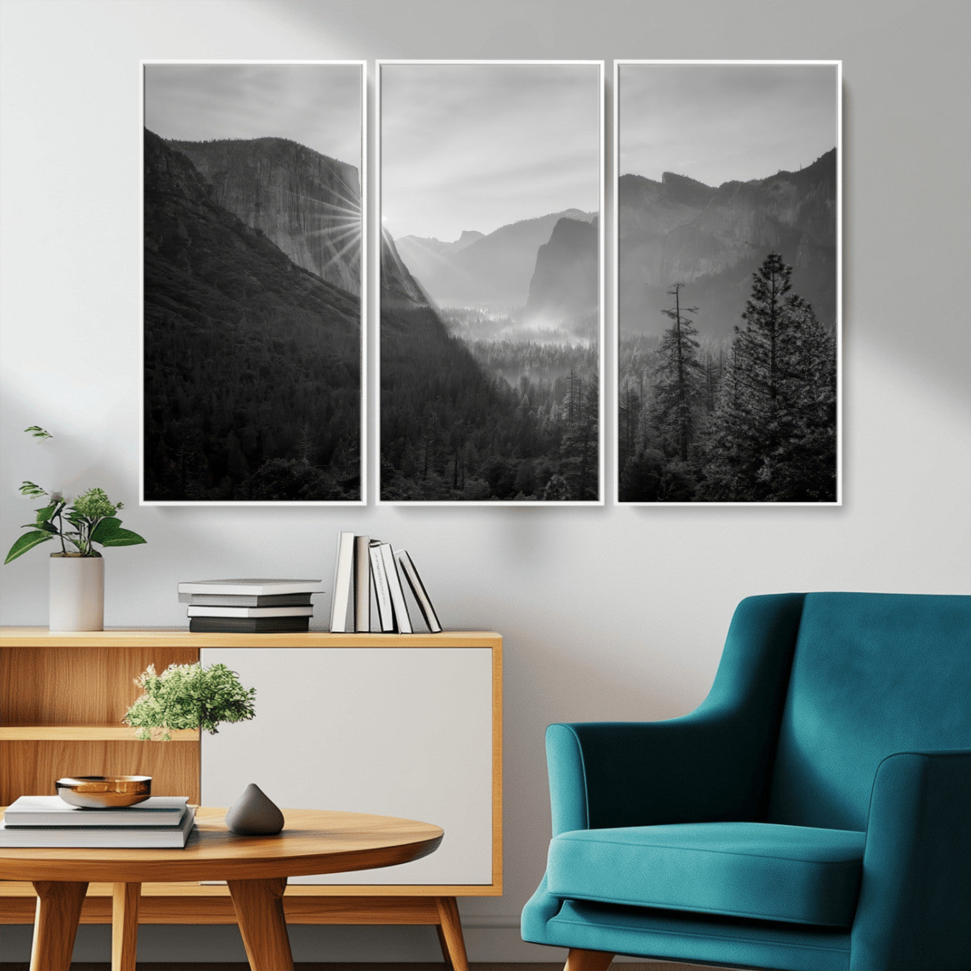 Black and white landscape of Yosemite with sun rays peeking over El Capitan, ideal for moody nature or modern rustic decor.