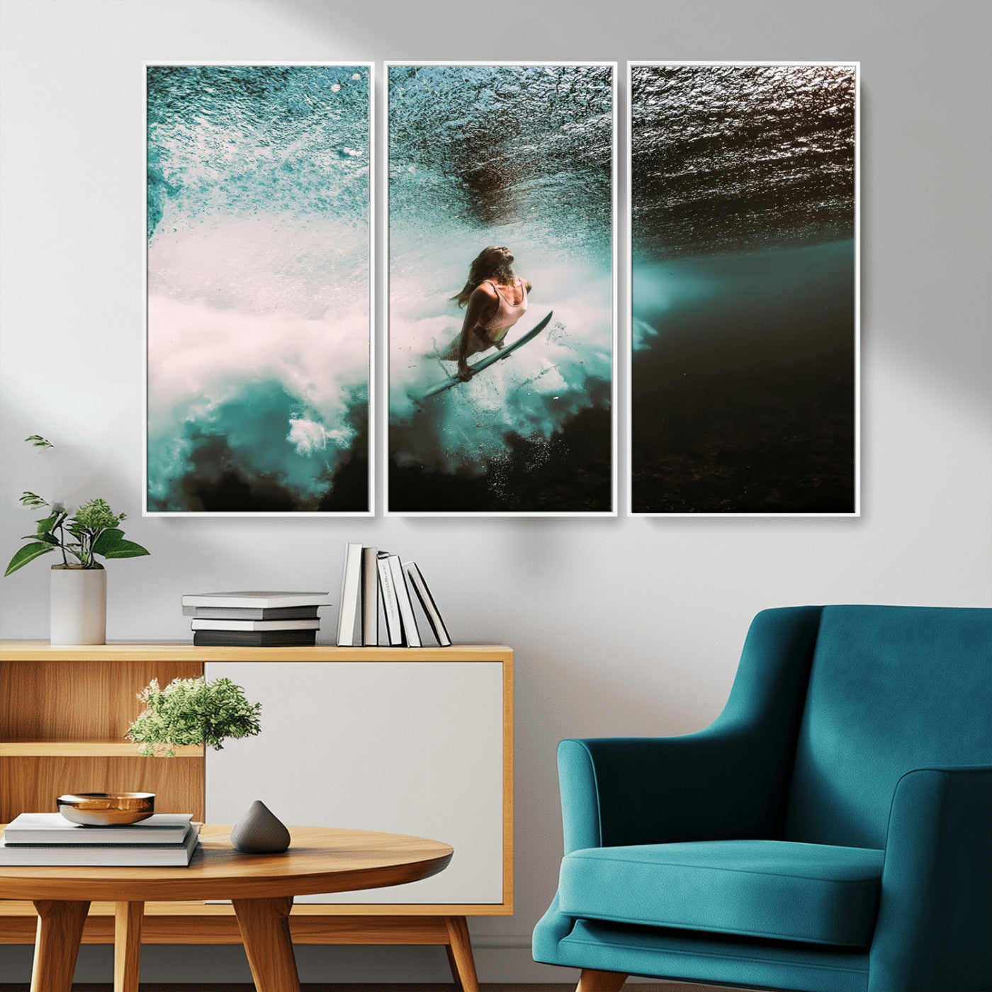 Vibrant underwater photo of a female surfer diving through turquoise waves, perfect for coastal boho or surf-inspired home decor.