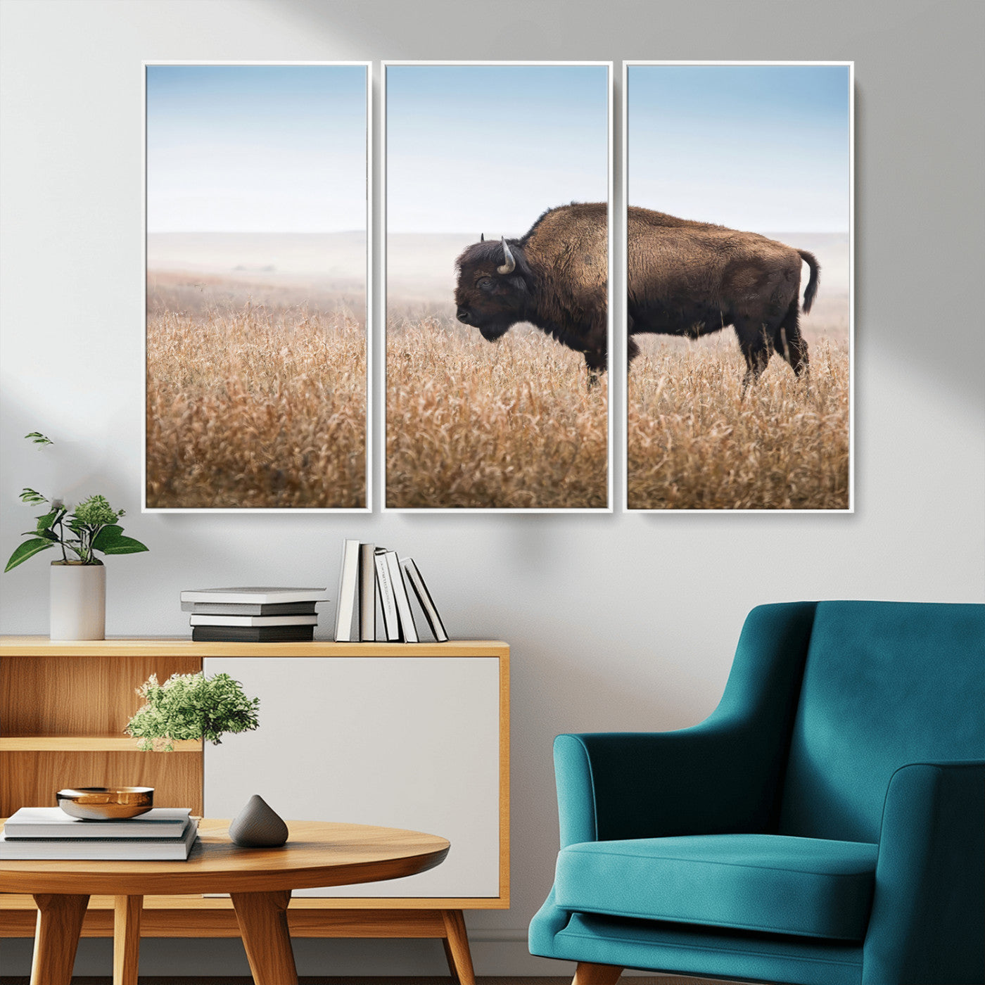 A majestic bison standing in an open prairie field, its strong form blending into the golden grass under a vast blue sky, evoking the wild spirit of the American plains.